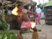 Joseph, dubbed one of the best fire twirlers in all Fiji, is son king a local village.  Notice his tattoos... they covered legs and midriff.  Many Fijians are heavily tattooed.
